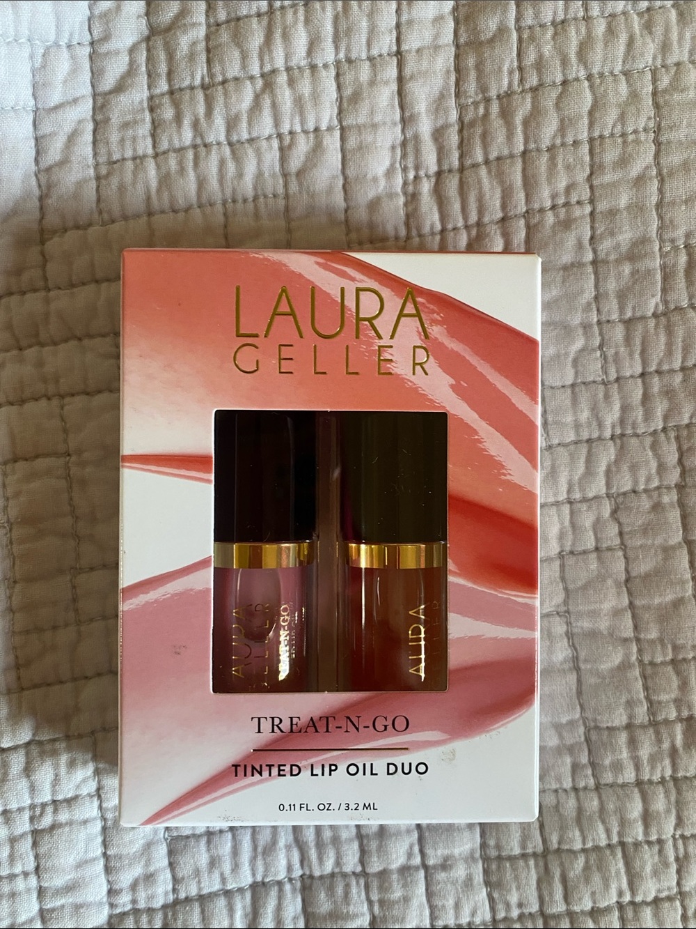 Laura Geller treat n go Tinted Lip Oil Duo – knock out and champion